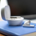 Poly Voyager Free 60+ UC M White Sand Earbuds +BT700 USB-A Adapter +Touchscreen Charge Case - 2338019