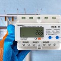 Qoltec 50883 Trójfazowy elektroniczny licznik | miernik zużycia energii na szynę DIN | Wi-Fi | TUYA | 400V | LCD - 2310830